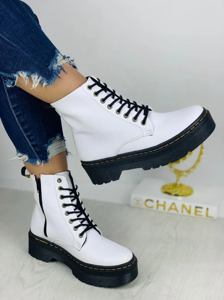 Striking Elegance  Black White Boots