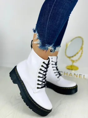 Striking Elegance  Black White Boots